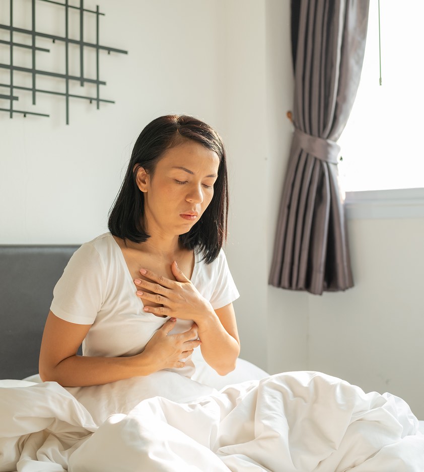 Donna con reflusso gastroesofageo